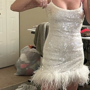 White sequin and feather Akira dress